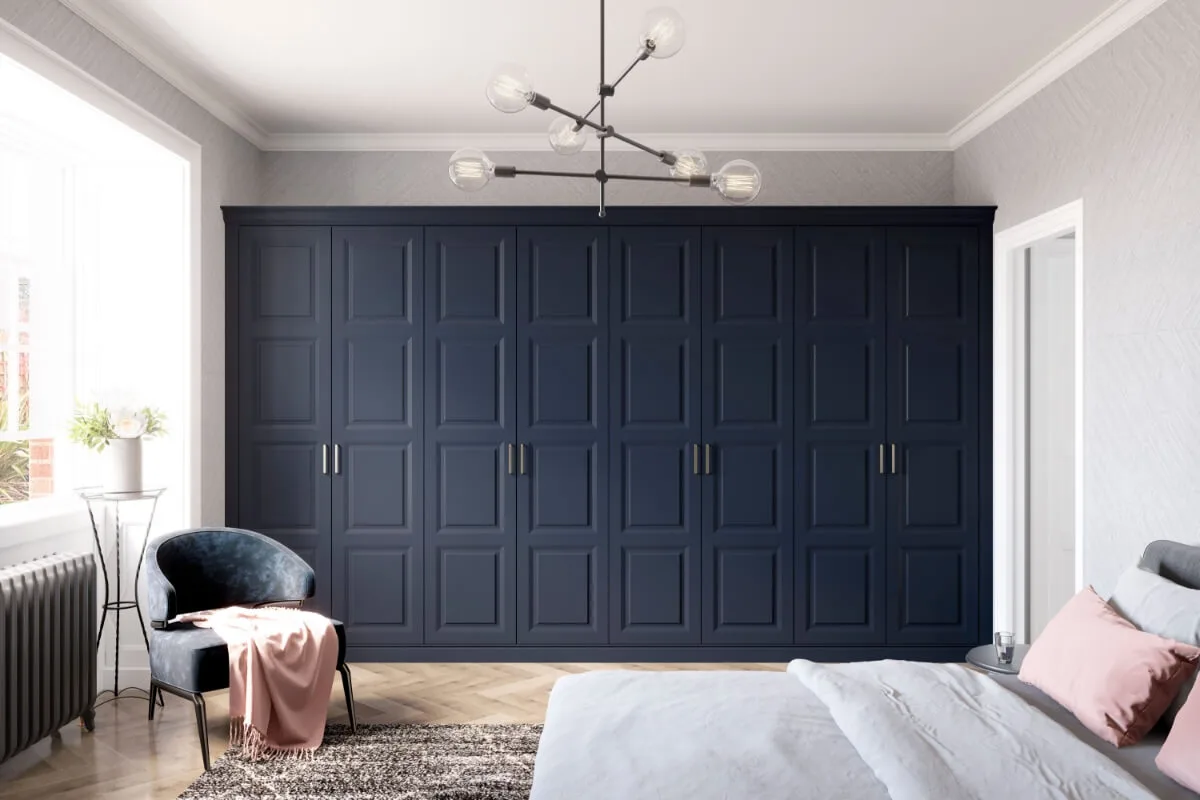 Kensington fitted wardrobes in navy with raised-panel doors